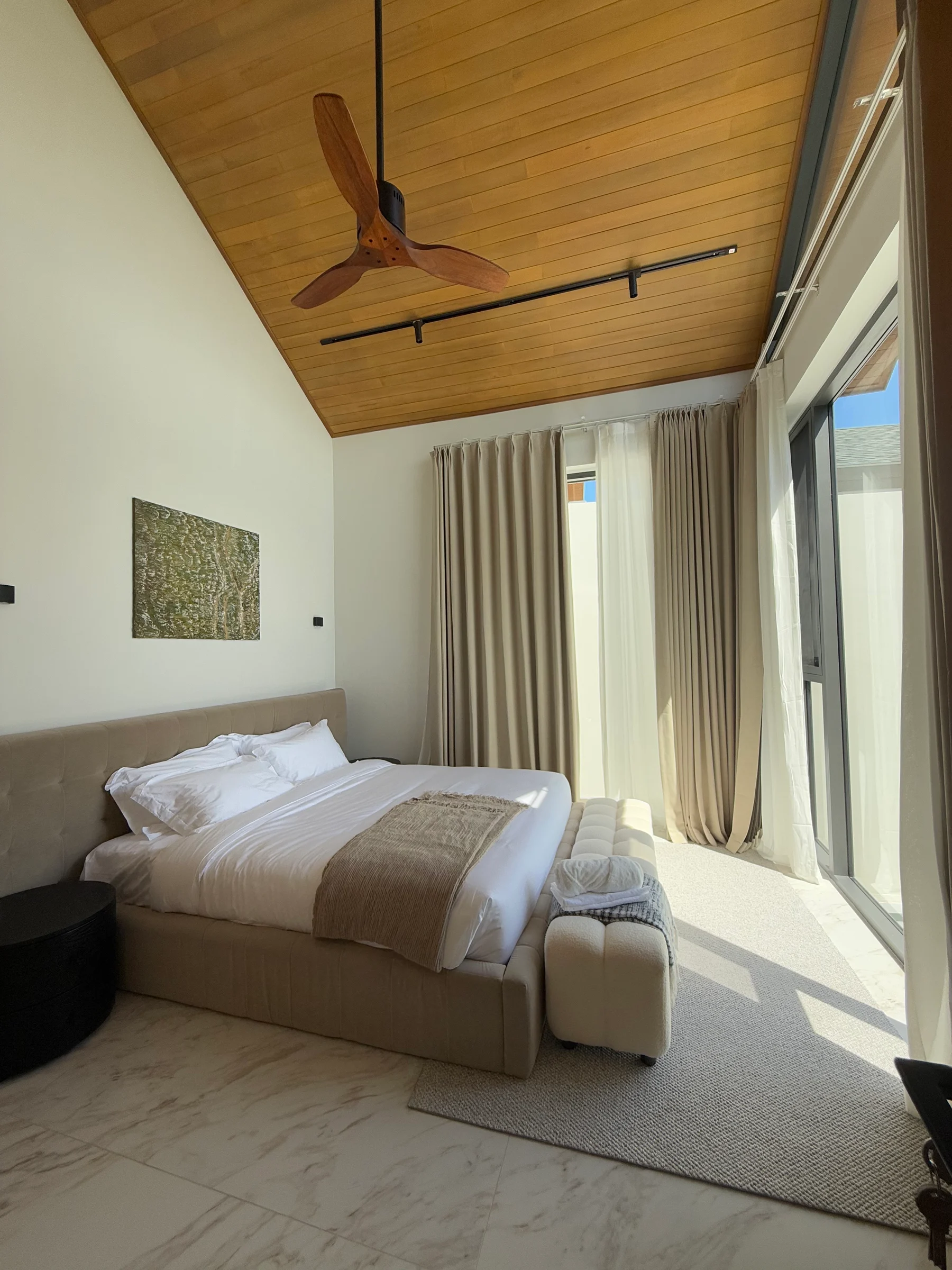 Bedroom with a vaulted timber ceiling