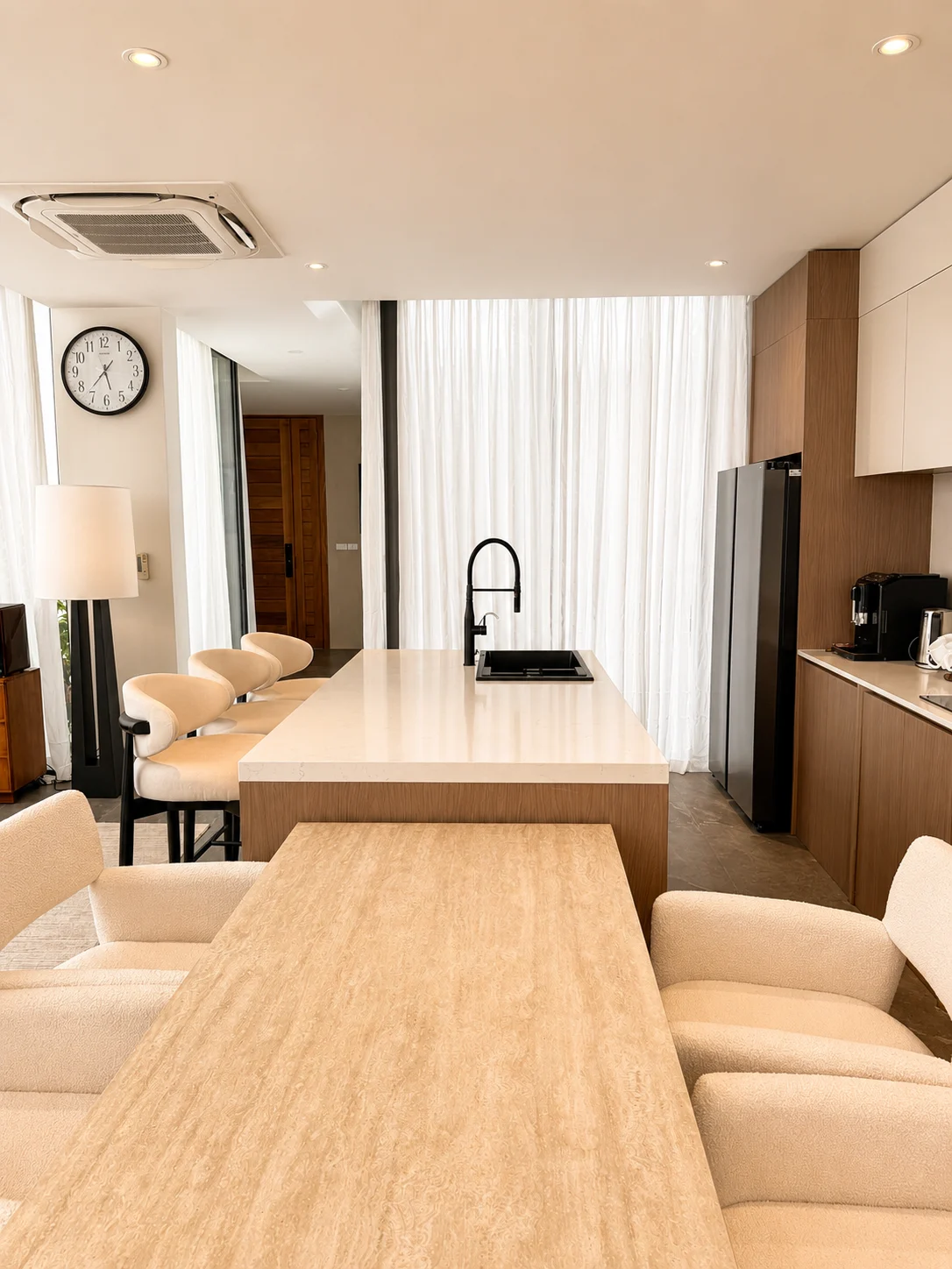 Kitchen and dining area with warm timber finishes
