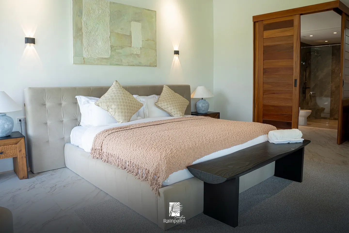 Bedroom with upholstered bed and bench