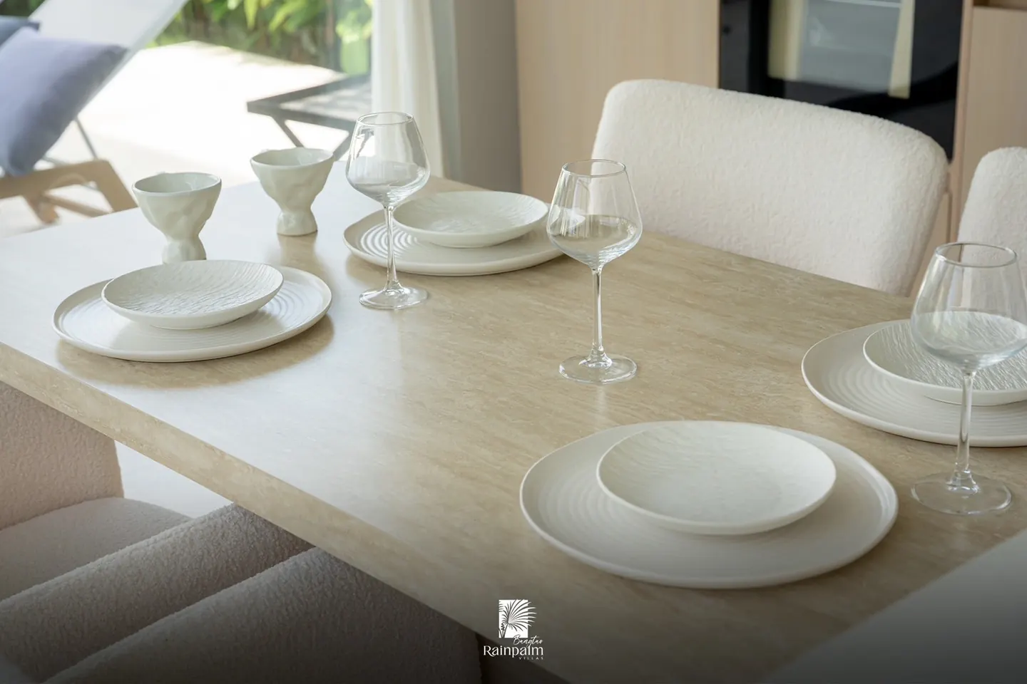 Dining table laid with tableware
