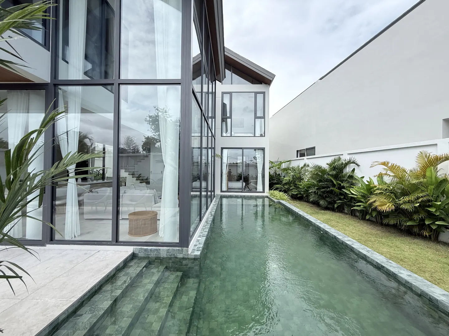 Long pool running beside the villa